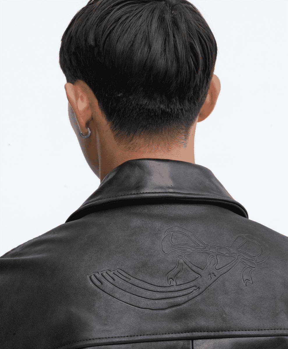 Detail shot of a Soulland garment featuring unique stitching and organic cotton texture.