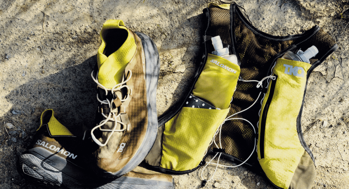 Runner wearing the T.K.O. collection hydration vest featuring front-loading bottles.