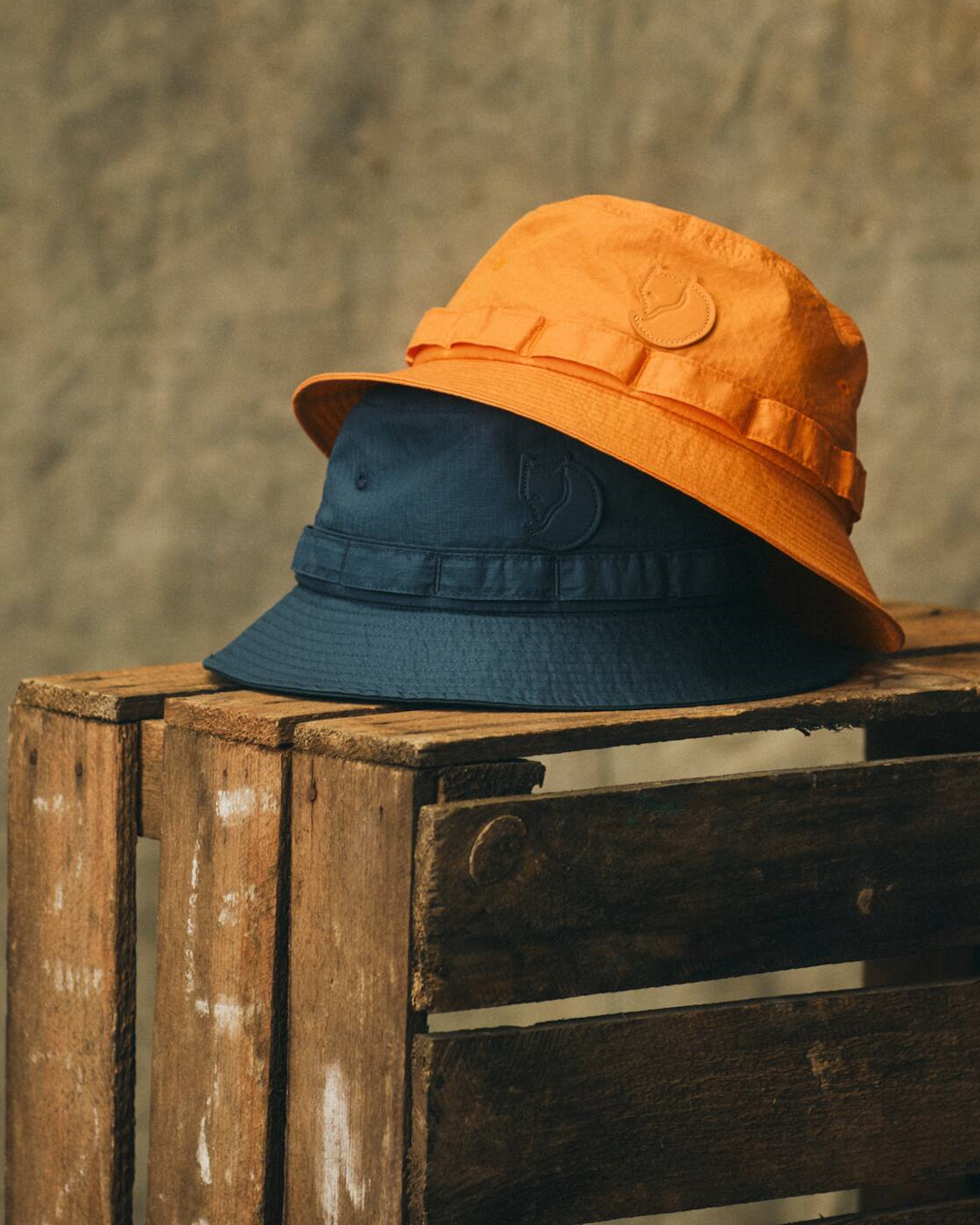 A small Samlaren pocket accessory showcasing intricate stitching and recycled G-1000 textile.