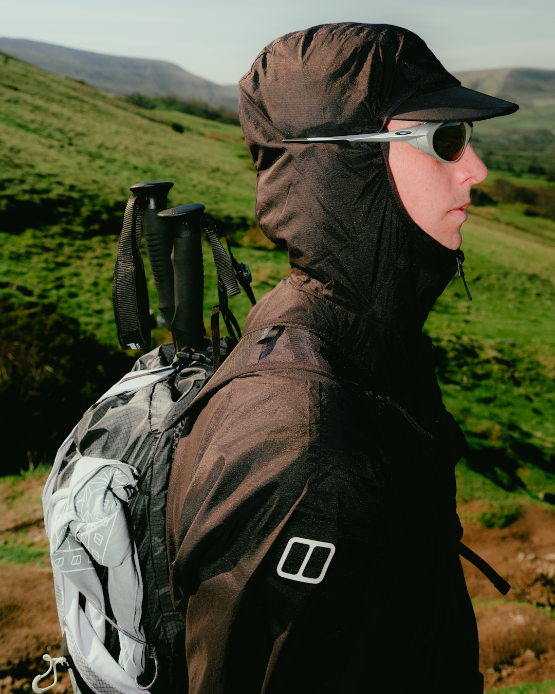 Close-up of the side compression straps and back panel featuring the Limpet design on a Berghaus backpack.