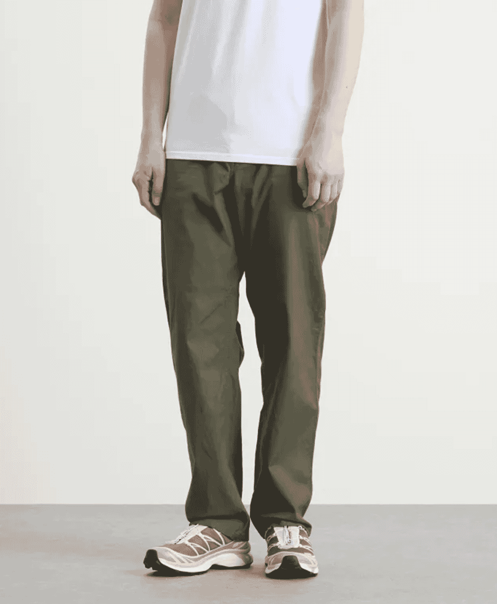The Patagonia Lightweight All-Wear GI Trousers in a dark shade.