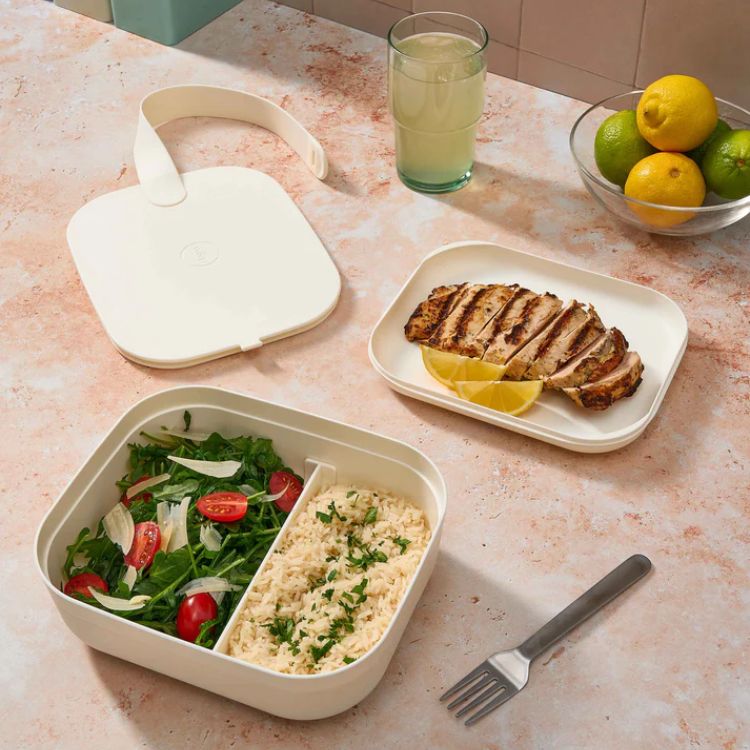 Minimalist bento lunch box with a secure strap