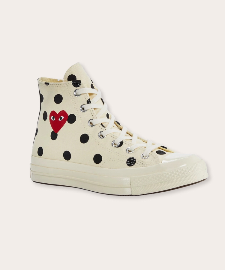 Comme Des Garçons High Top Sneakers with heart logo.