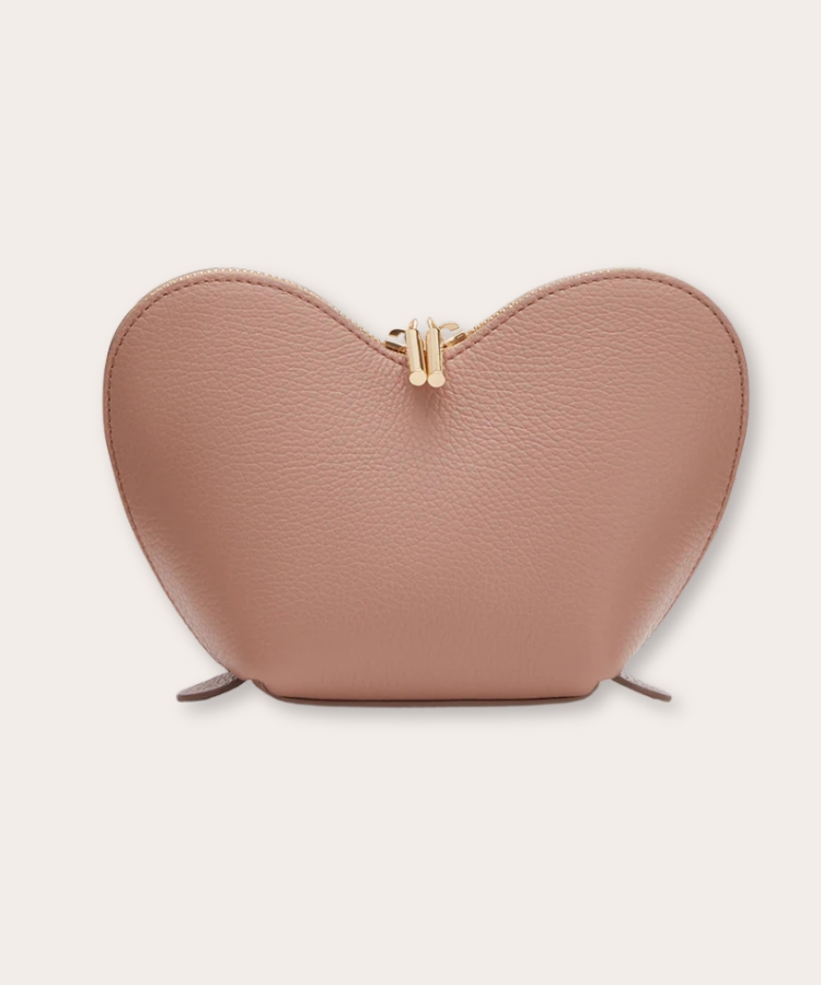 Cuyana Mini Heart Case in red leather.