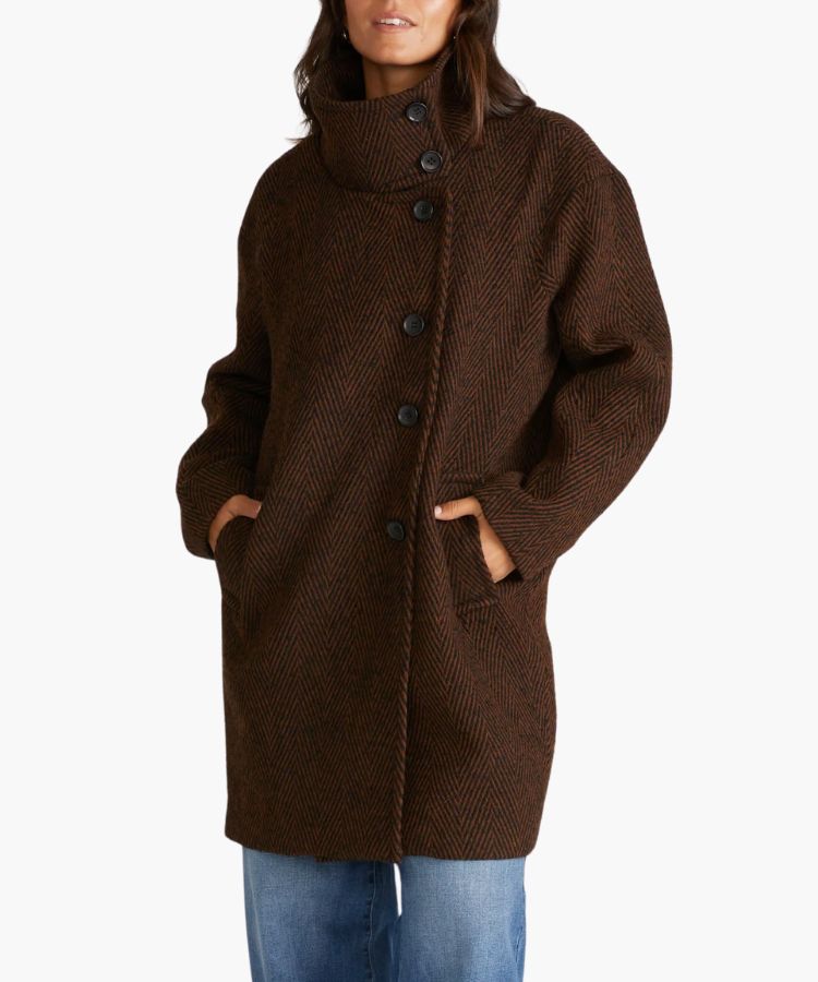 The Marlo Cocoon Coat from Universal Standard in a sleek black finish.
