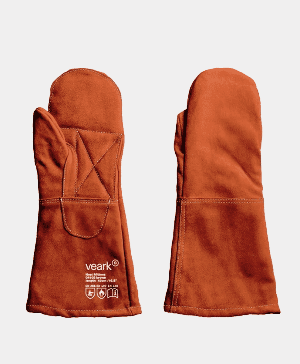 Both Vaerk Heat Mittens laid out on a table.