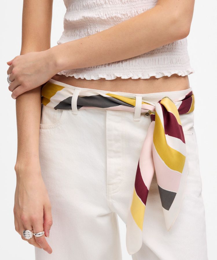 An oversized silk bandana with a geometric pattern.