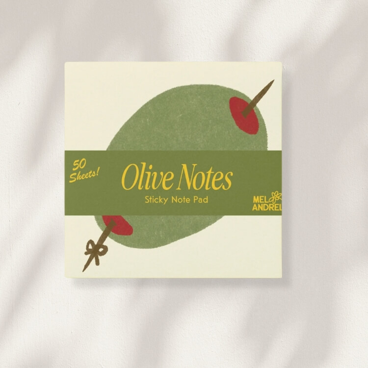 Sticky notes shaped like a martini glass with a green olive