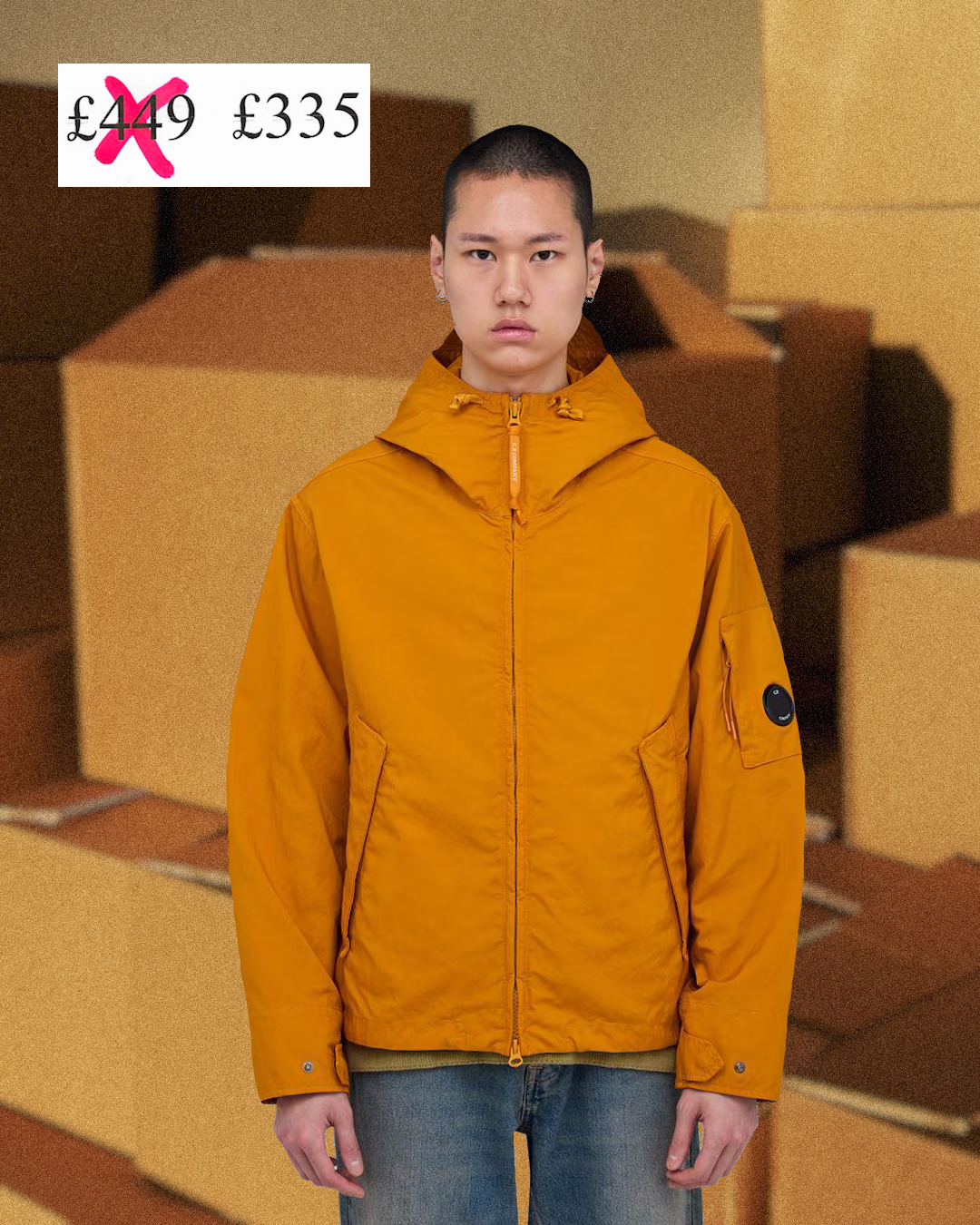 Street-style shot of a man wearing a sleek black puffer jacket in a city.