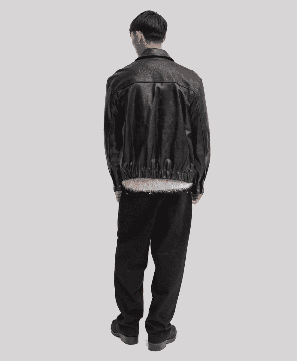 Contemporary oversized silhouette jacket with avant-garde pocket details.