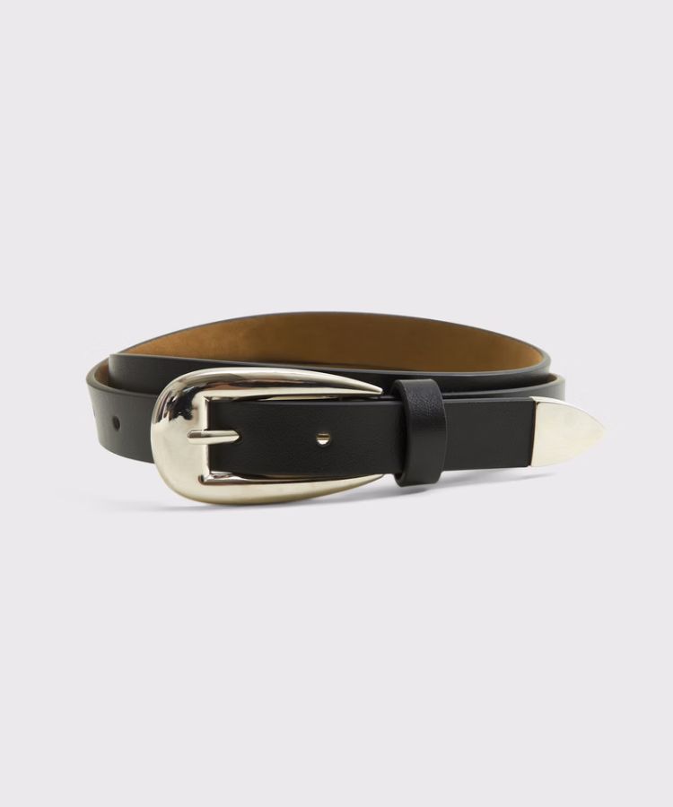 Leather belt with a large ornamental silver buckle.