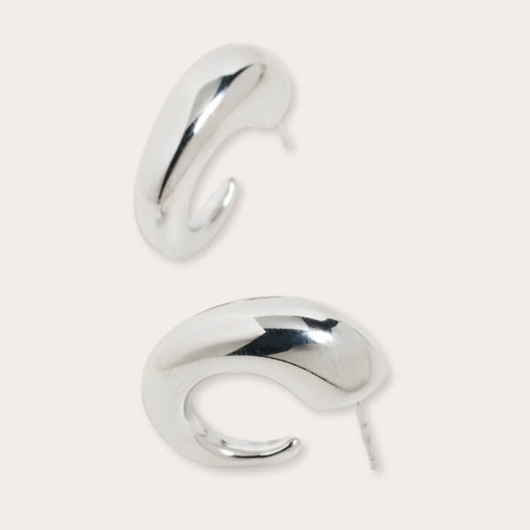 By Adina Eden Bubble Hoop Earrings in polished silver.