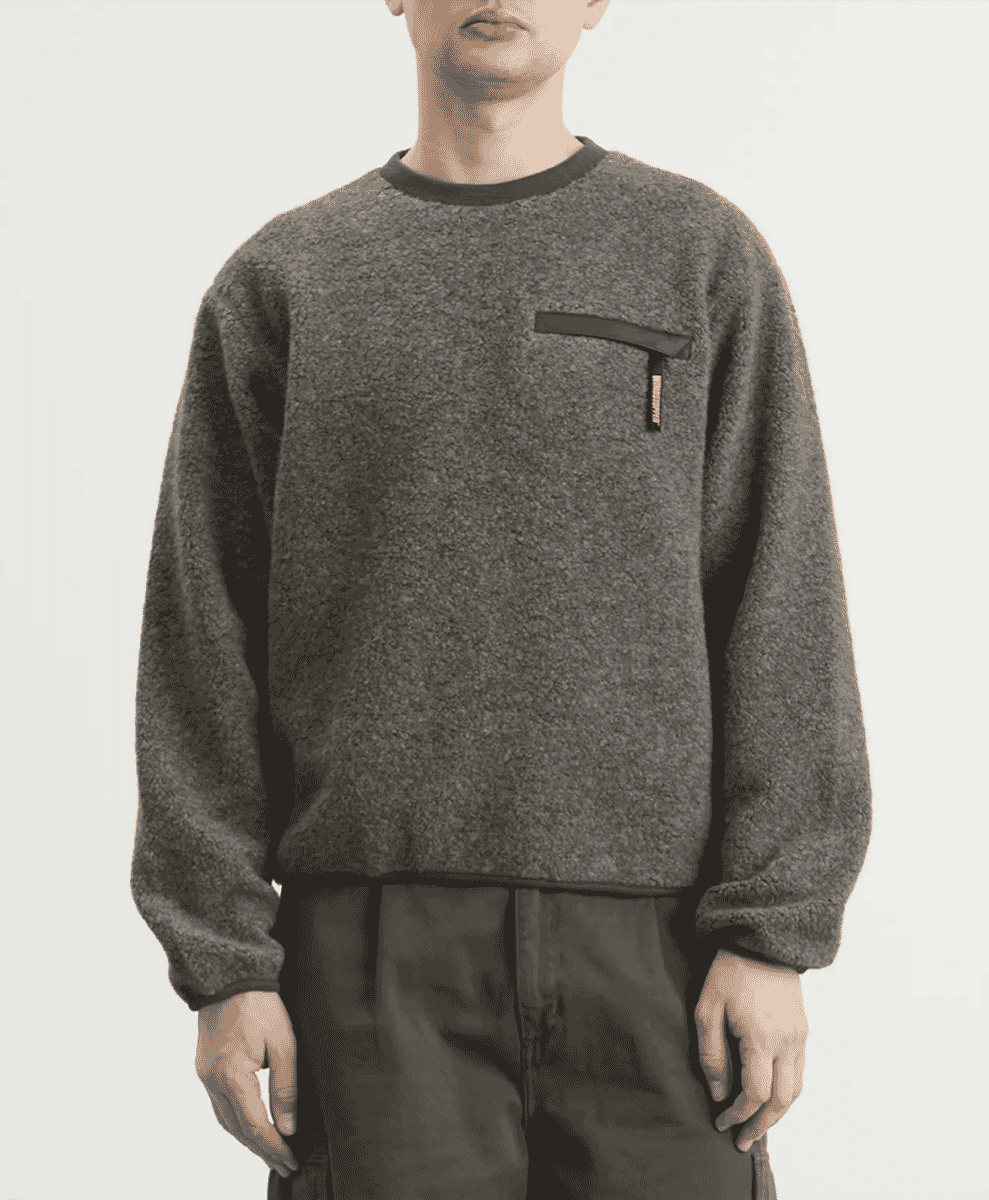 Front view of the grey Thisisneverthat Windstopper Pullover.