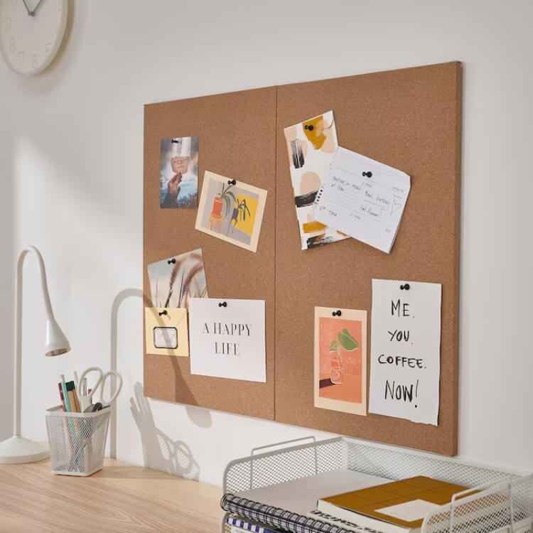 Minimalist bulletin board with pinned photos and notes