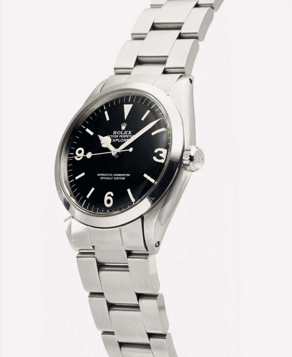 A vintage Rolex Explorer showcasing tropical dial patina and original steel bezel details.