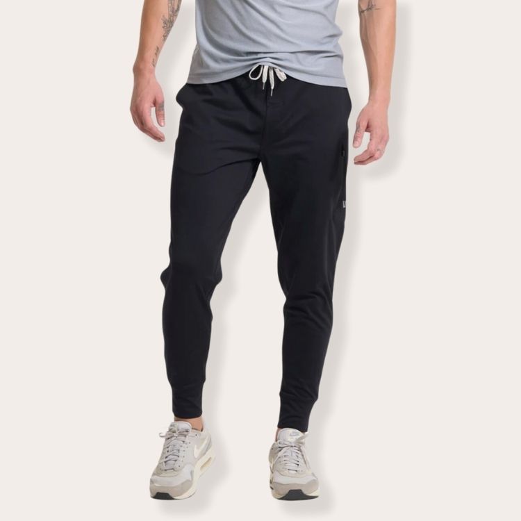 Vuori Sunday Performance Joggers in a charcoal grey color.