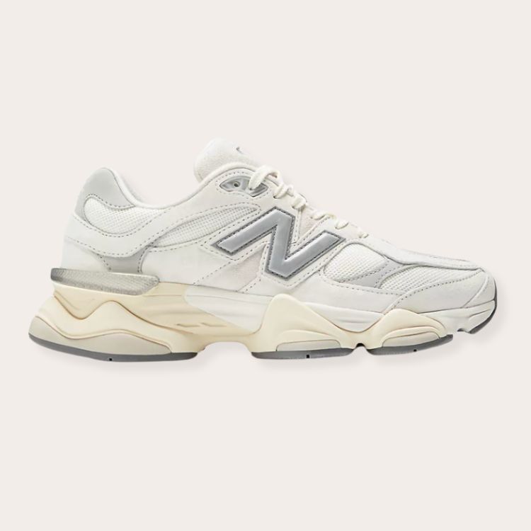Chunky New Balance 9060 sneakers in white.