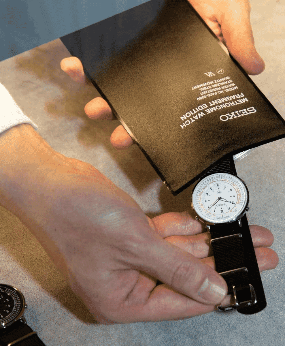 Alternative view of the Fragment Seiko Metronome watch in its white colorway variant.