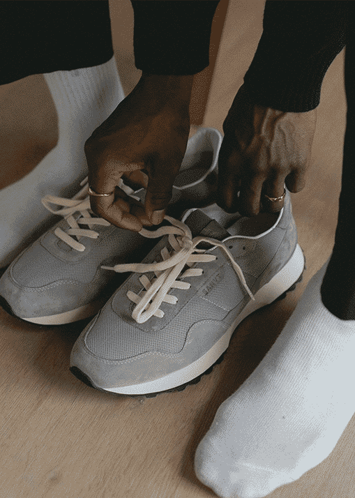 SANVT minimalist white sneakers designed for professional wear.