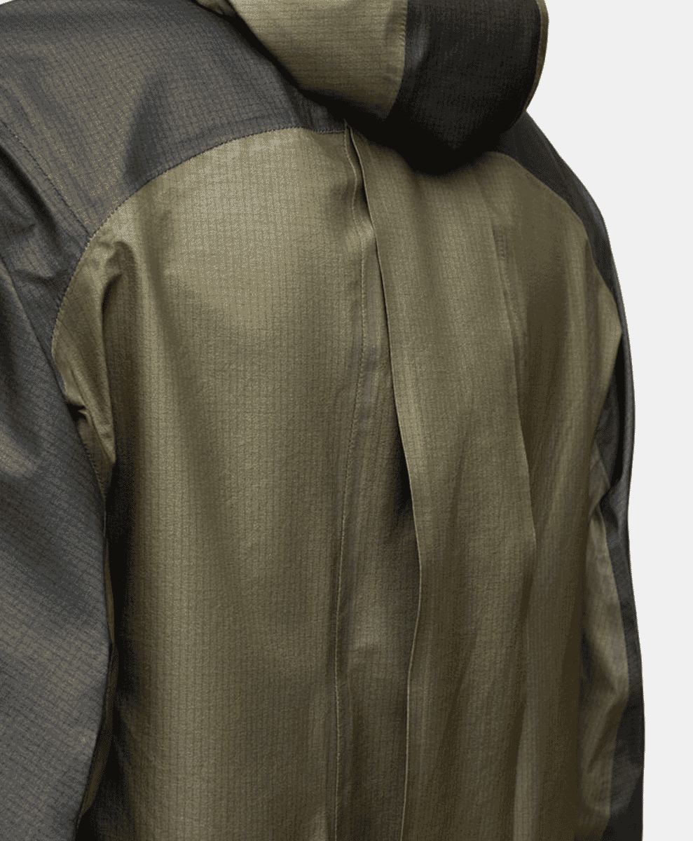 Profile shot of the jacket's hood adjusted tightly around the wearer's head.