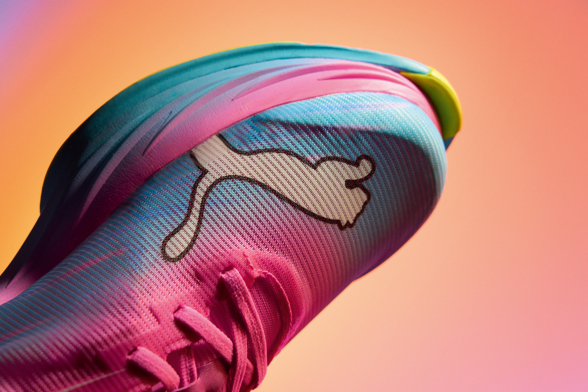 Side-by-side studio shot of the Puma Fast R3 racing shoe and the max-cushioned MagMax Nitro 2.