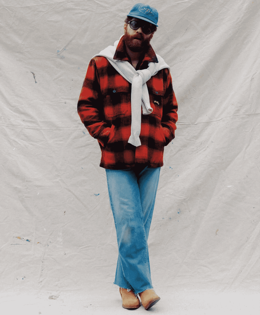 Model wearing classic olive green Stan Ray fatigue pants.