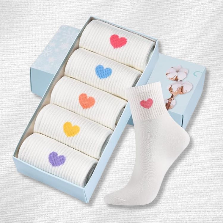 White socks with a single small red heart embroidered on the ankle.