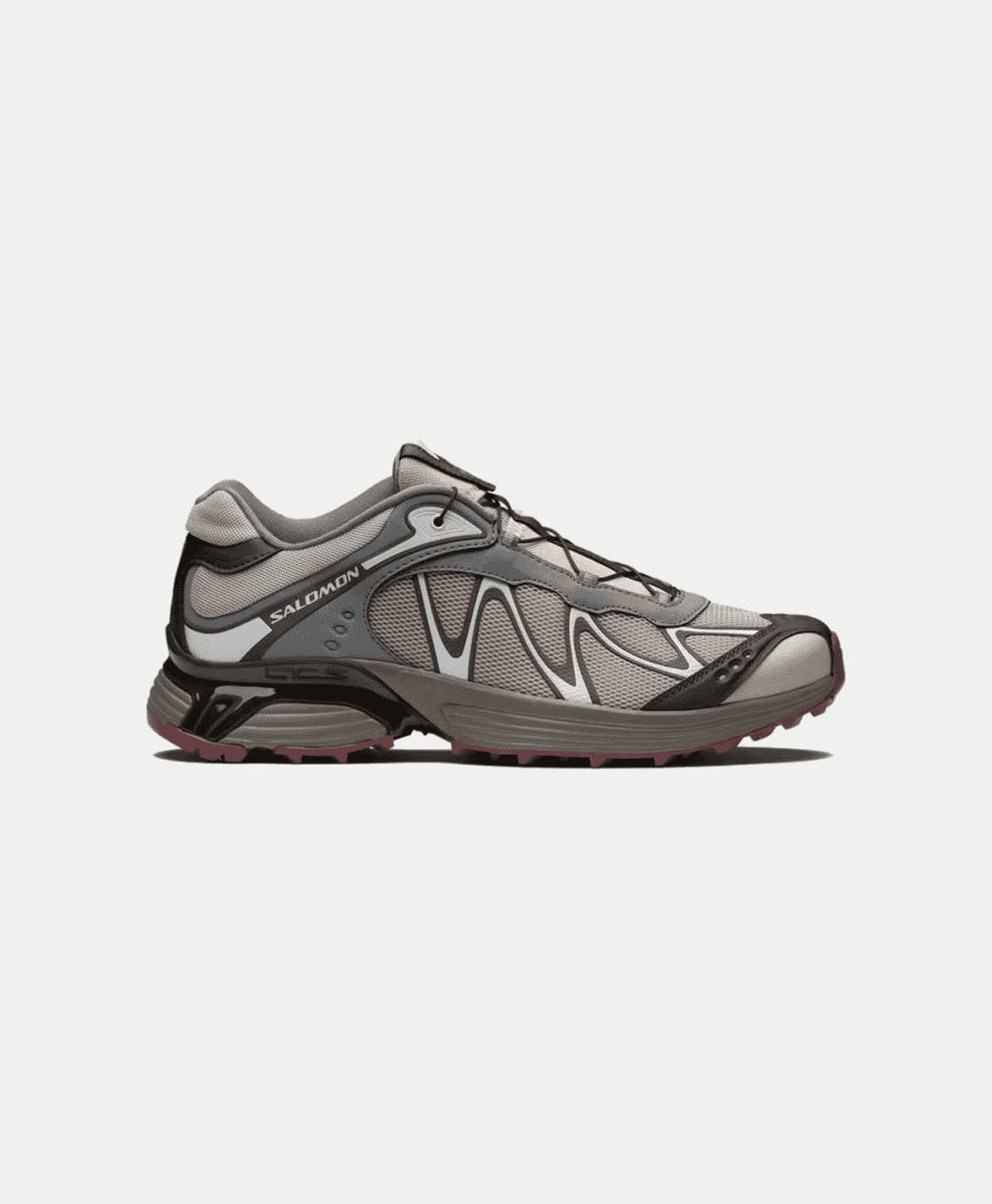 The streamlined profile of the Salomon XT-Whisper in a clean, neutral colorway.