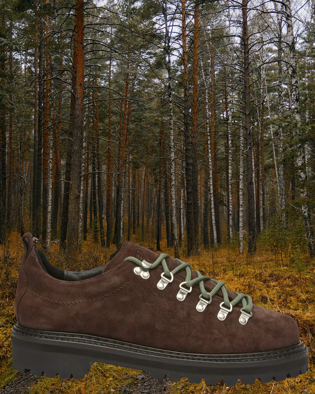 Lifestyle shot of leather Danner Field Low hikers on a cobblestone city street.
