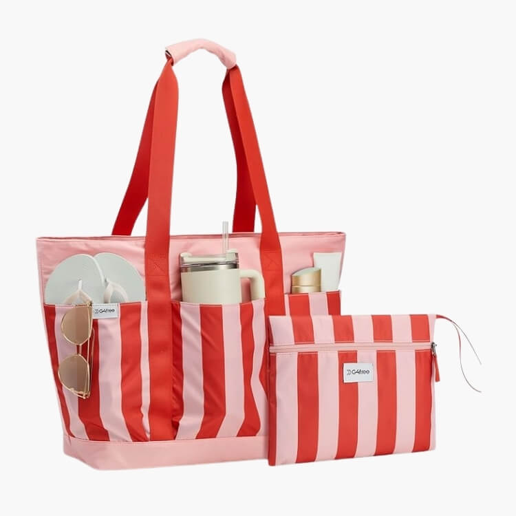 A pink and red striped beach bag with a matching zippered pouch for accessories.