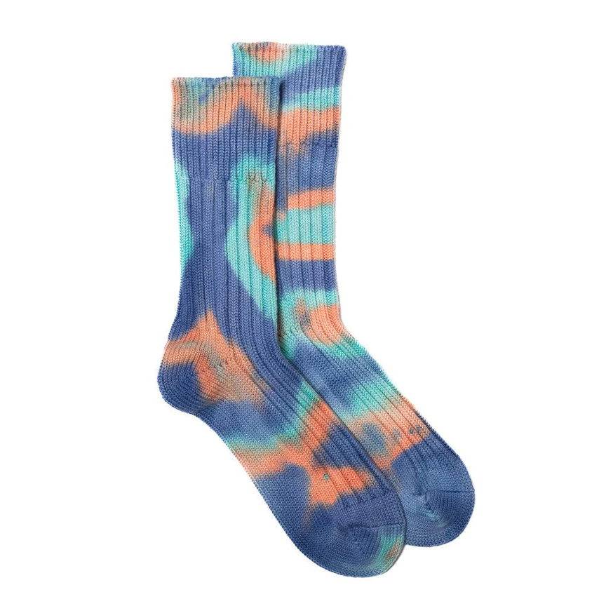 Ribbed tie-dye socks featuring a vibrant blend of blue, orange, and teal.