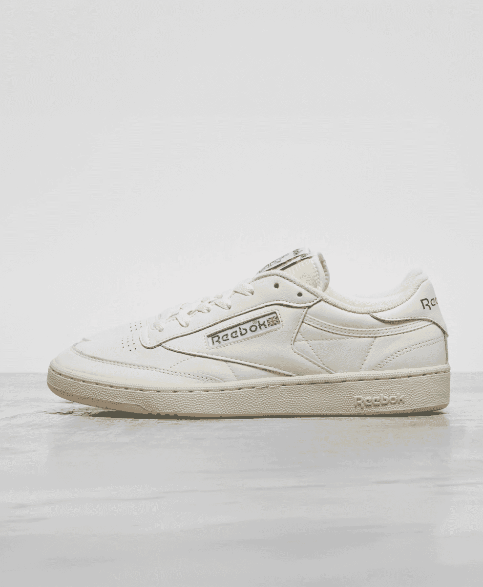 Classic white Reebok Club C low-top sneaker with minimalist branding and vintage ivory sole