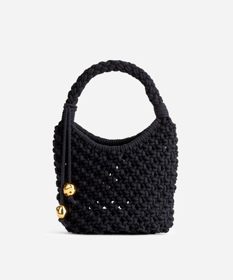 A mini bag with rope handle details.