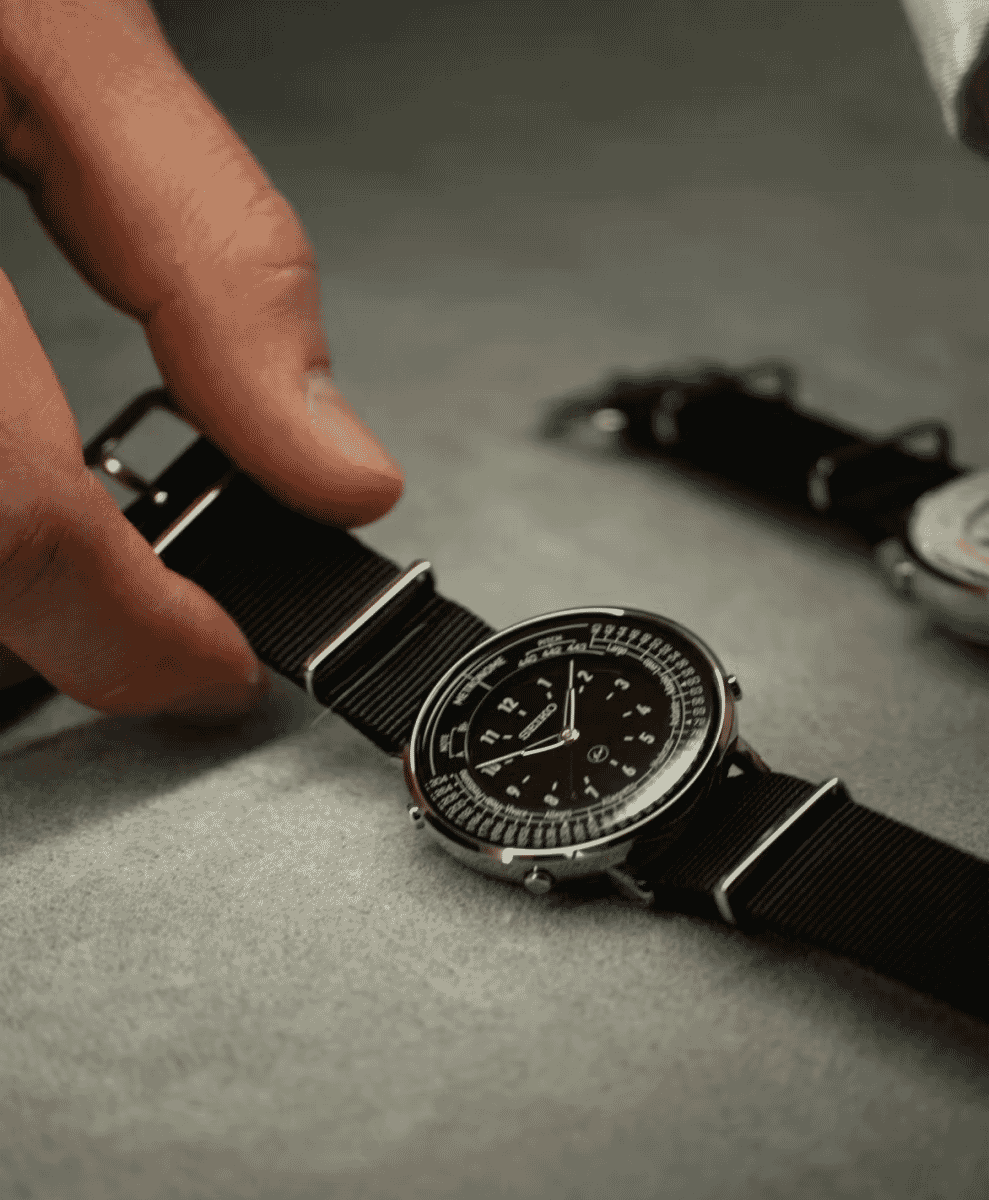 Detailed view of the Seiko Metronome watch hands and functional markers for BPM and pitch.