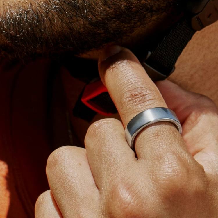 The Oura Ring 4 smart health and fitness tracker in titanium.