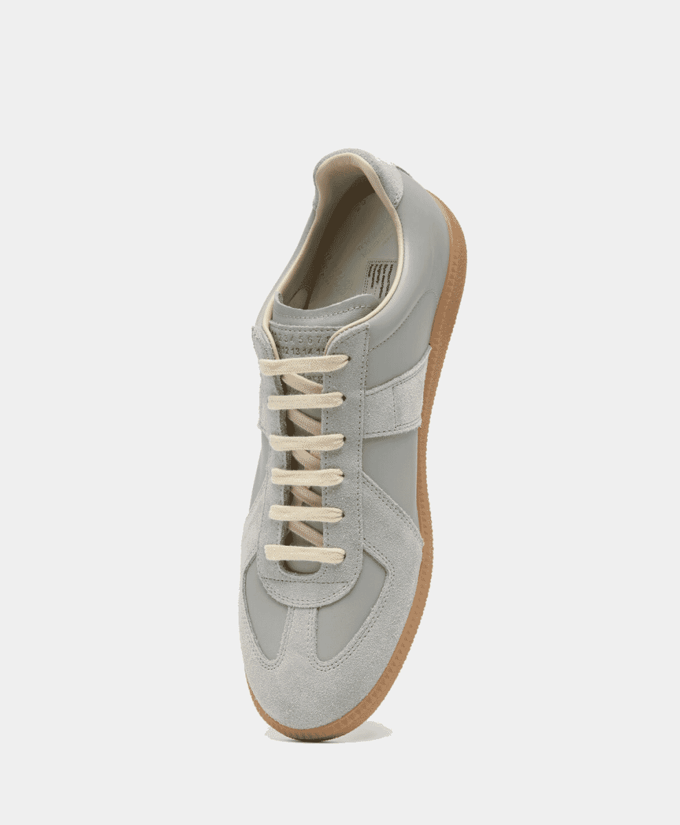 Maison Margiela Replica sneaker in white leather with grey suede overlays on the toe and sides