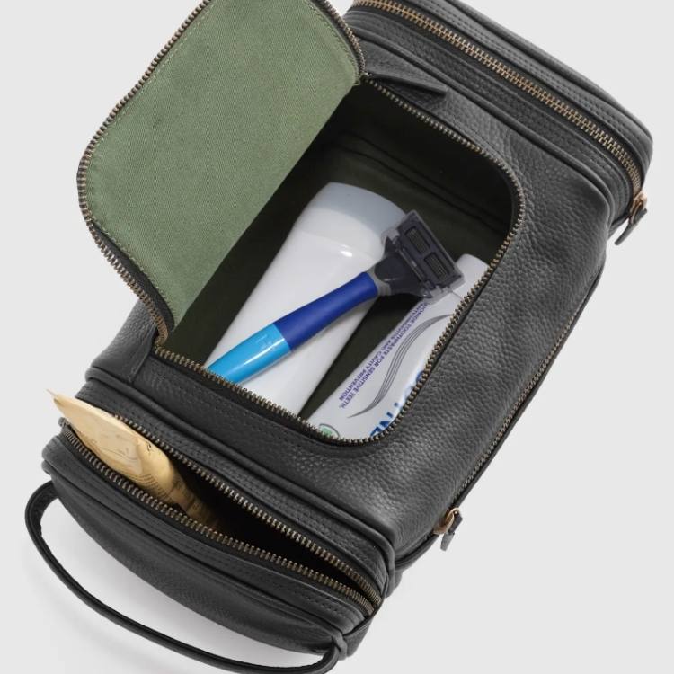 Brown Nappa leather toiletry bag with zipper.