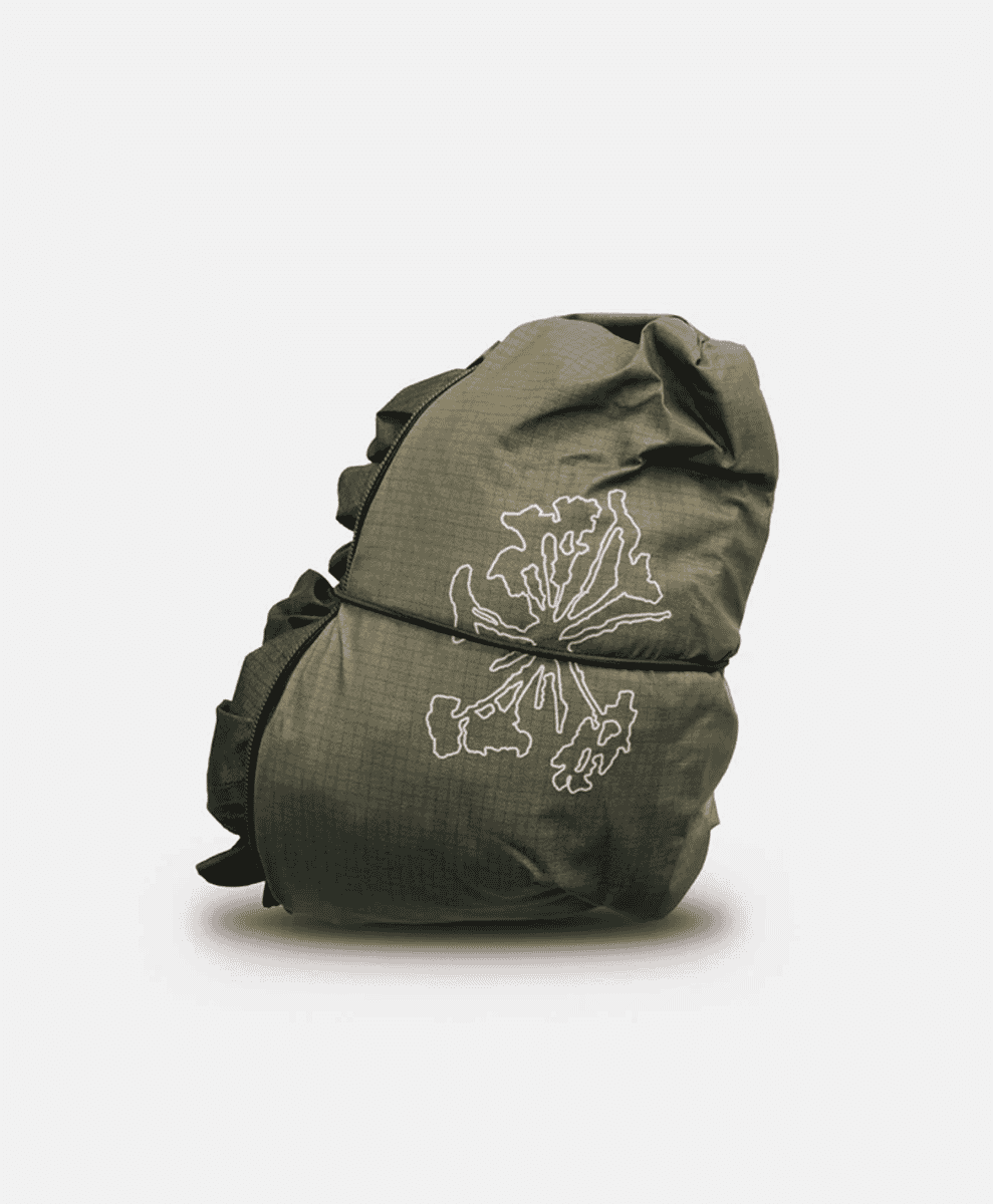 Close-up of the YKK two-way waterproof zipper partially unzipped from the bottom.