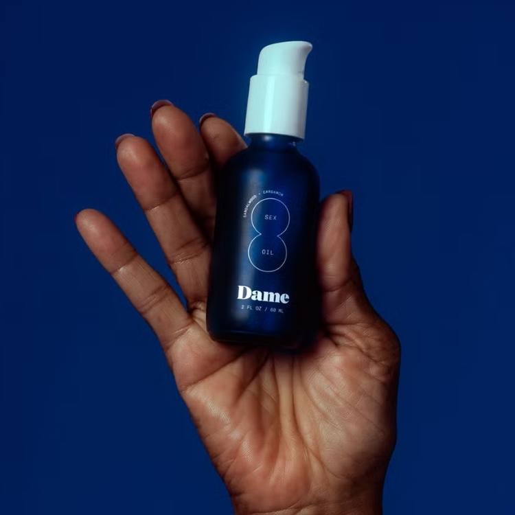 A bottle of Dame massage oil.