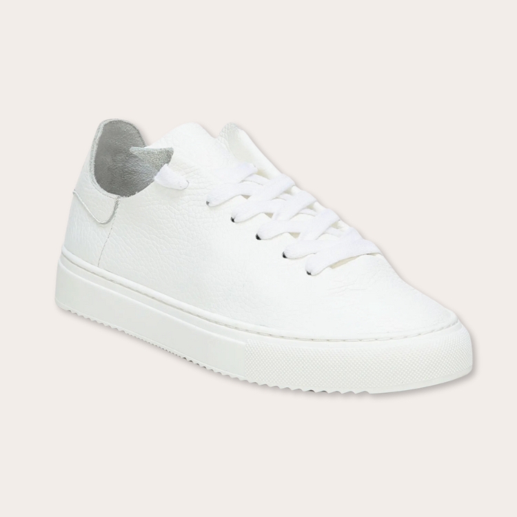 Streamlined white leather poppy sneakers.