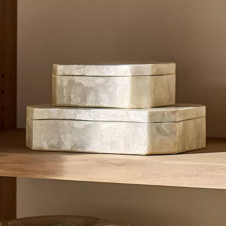 Decorative box made of capiz shell with a pearlescent finish.