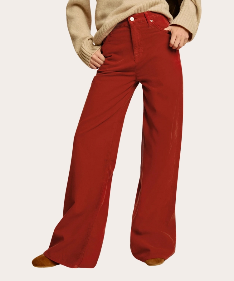 Reformation Corduroy Pants in deep red.