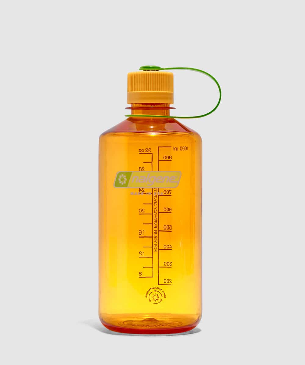 A translucent orange Nalgene water bottle with a green loop handle.