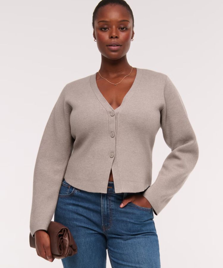 Oatmeal-colored LuxeLoft cardigan with rounded sleeves.