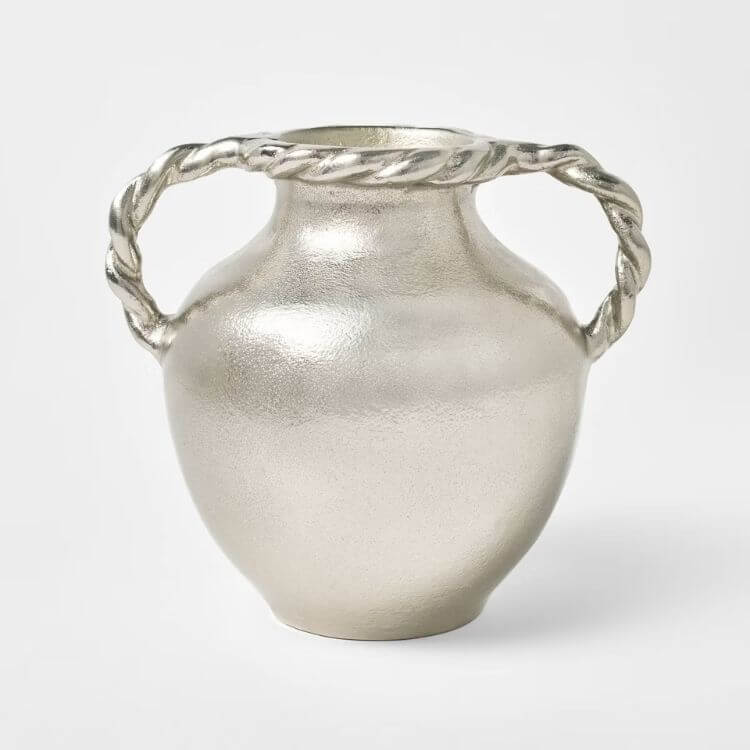 Polished silver vase with elegant side handles.