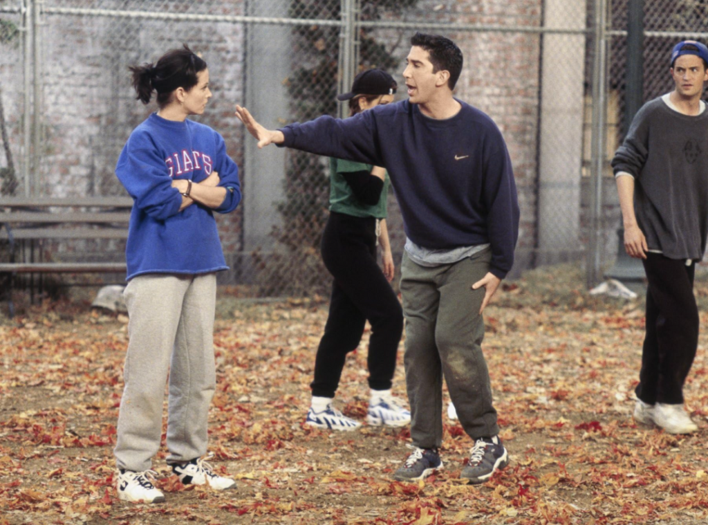 Monica Geller wearing a casual oversized sweatshirt.