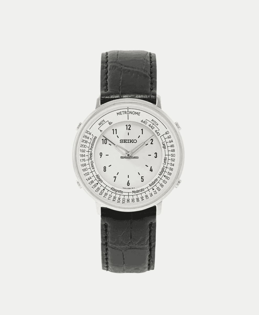 Angled product shot of the Fragment Seiko Metronome highlighting the nylon webbing strap and monochromatic finish.