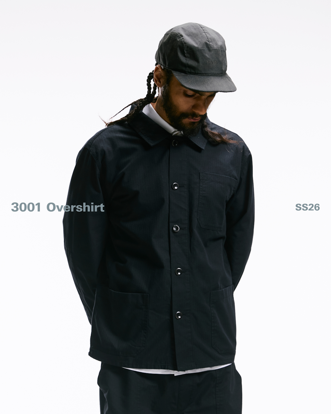Side profile of a model wearing the 3001 overshirt, demonstrating the relaxed but functional silhouette.