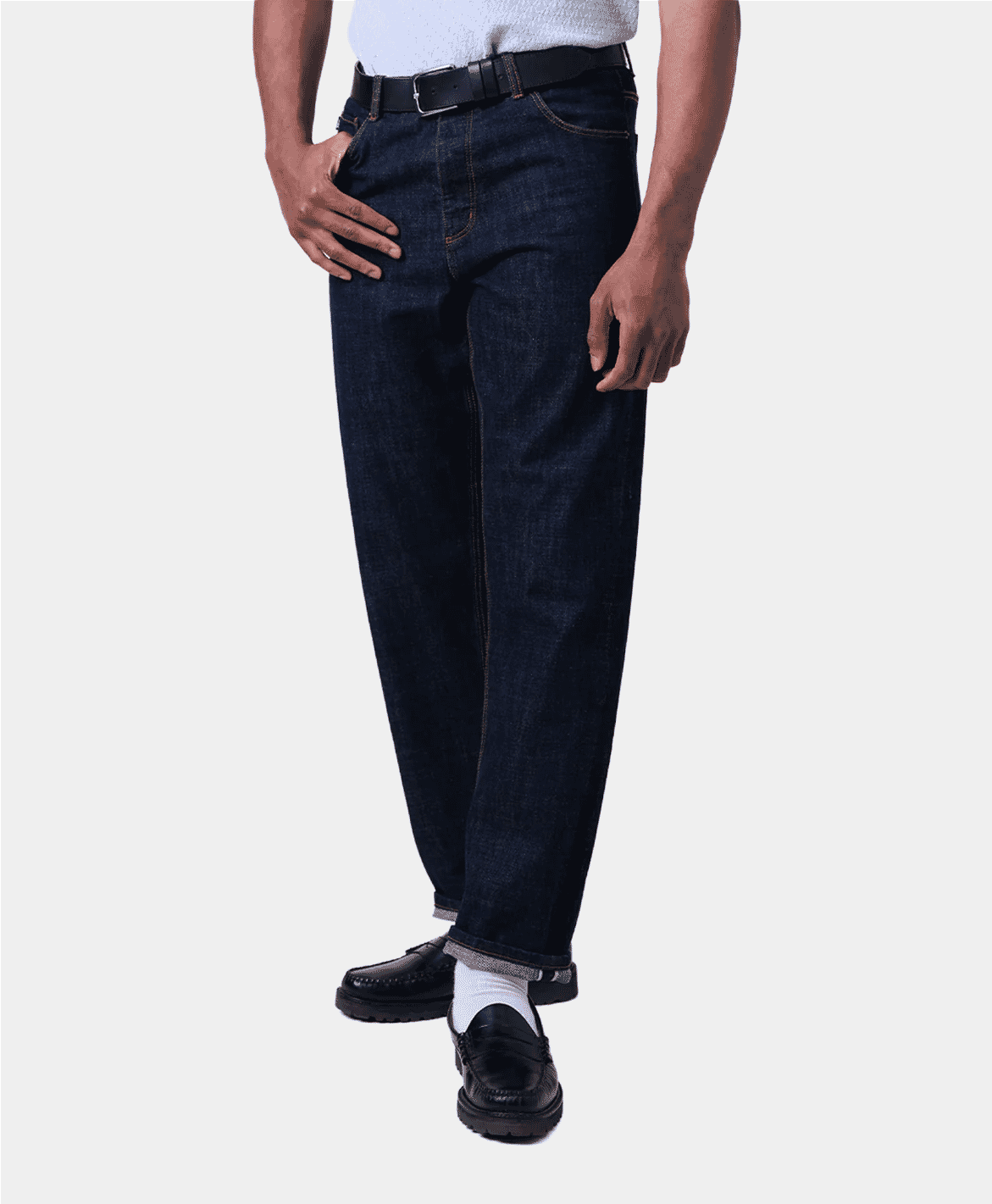 Close-up of high-quality indigo denim fabric showing the weave grain.