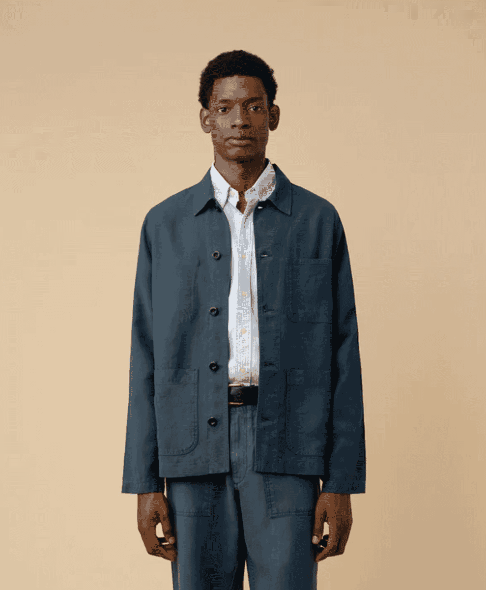 A man wearing a polished ISTO smart casual outfit emphasizing clean lines and a relaxed fit.
